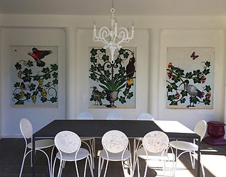Mosaic tryptic wall feature including vines and local fauna
