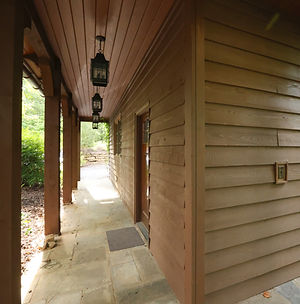 Custom wood detailing of a breezeway rebuilt after Hurricane Helene in the Cliffs at Keowee Vineyards.