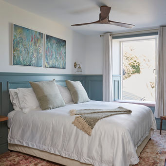 Charming boutique hotel bedroom with a mixture of Victorian and contemporary design features