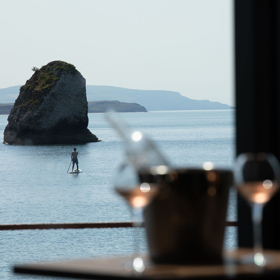 Paddleboarder at Freshwater Bay, Isle of Wight