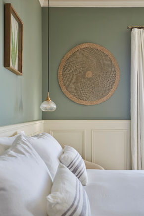 Custom-built wooden cabinetry and shelving unit by Acorn Interiors in Freshwater, Isle of Wight.