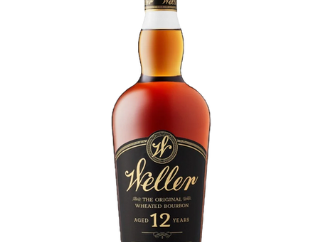 Bottle of Weller 12-year wheated bourbon on black background, amber whiskey visible, gold-and-black label with text.