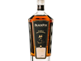 BlackFox whisky bottle with amber liquid and black-and-gold label