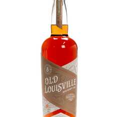 Old Louisville Whiskey bottle with amber liquid on black background, labeled Uncut Non-Chill Filtered and 8 years.