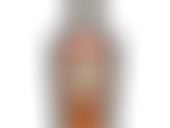 Bottle of Old Elk Slow Cut blended straight bourbon whiskey on a black background.