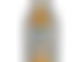 Bottle of Shelter Point Ripple Rock single malt whisky on black background, amber liquid, labeled Product of Canada.
