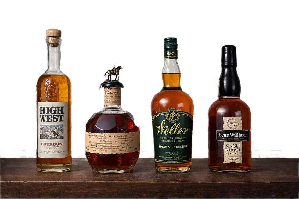 Four bourbon bottles on a wooden table; brick wall background. Labels: High West, Blanton's, Weller, Evan Williams.