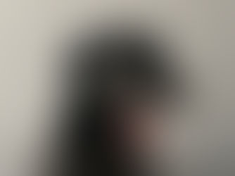 A black dog yawning - a calming signal
