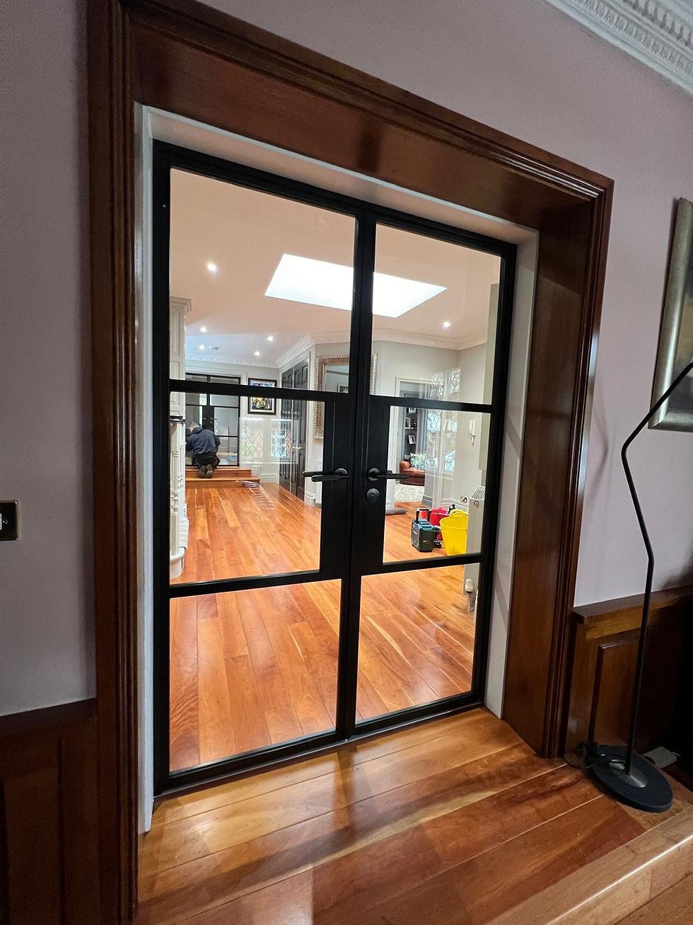 Refine Finishes Co. – interior glass door installation with black frames in Cheshire, showcasing modern craftsmanship and reliable service.