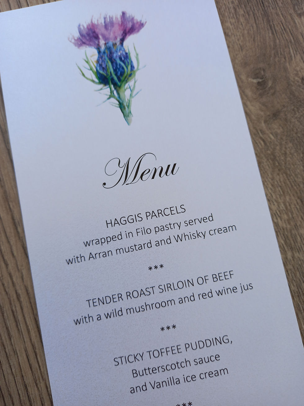 Thumbnail: Personalised wedding menu with a Scottish Thistle printed at the top. Single layer low cost, budget menu card.