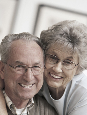 Older M-F couple with glasses