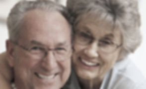 Older M-F couple with glasses