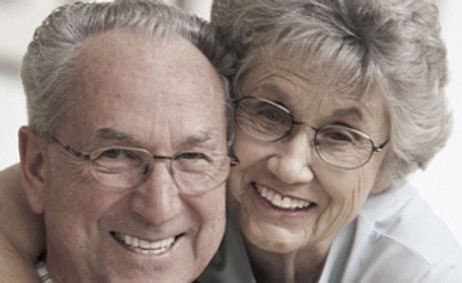 Older M-F couple with glasses