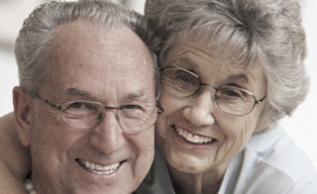 Older M-F couple with glasses