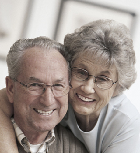 Older M-F couple with glasses