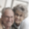 Older M-F couple with glasses