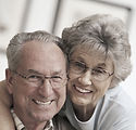 Older M-F couple with glasses