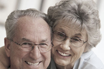 Older M-F couple with glasses