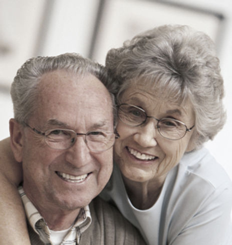 Older M-F couple with glasses