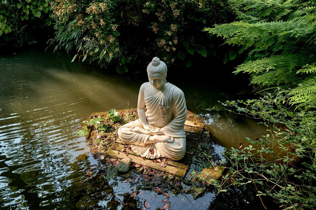 Buddha seduto Padmasana