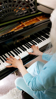 photo of judith muir playing piano