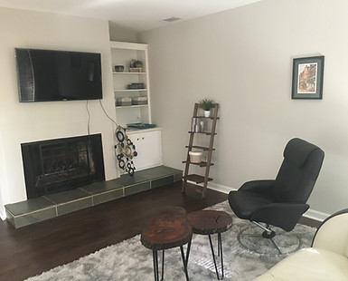 Shared living room with fireplace