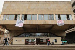 The 2009 occupation (photographer unknown) and the March 2026 occupation (photograph mine).