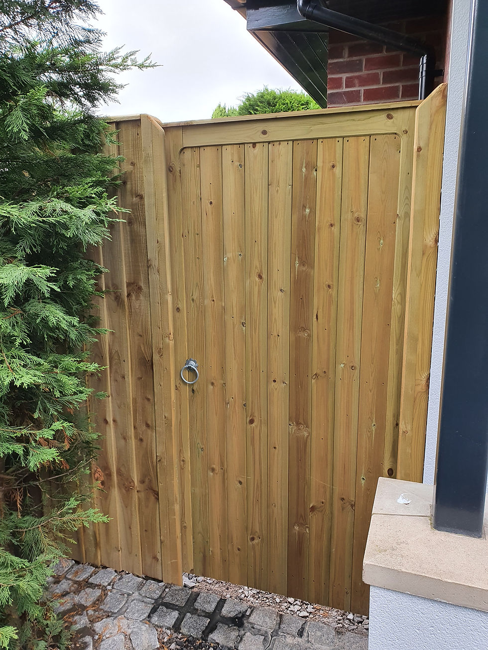 Made-to-measure softwood garden gate installed by Sale Fencing & Surfacing