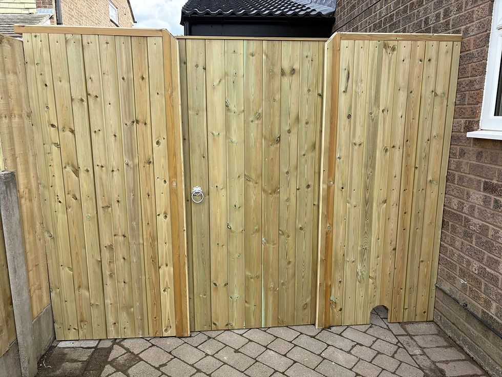 Wide-angle view of a timber garden gate in a green UK garden