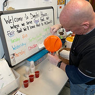 Volunteer Pouring Drink