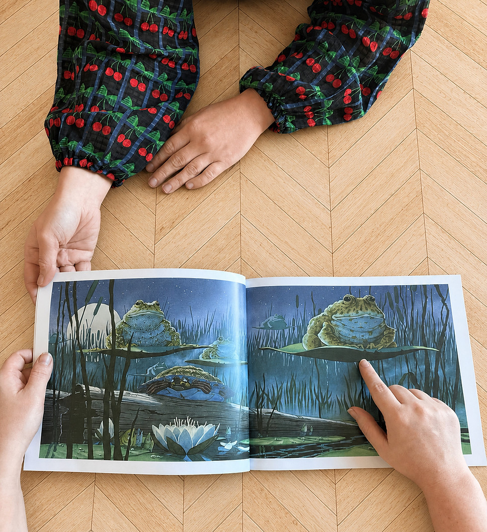 Child and adult using a picture book for autism assessment.