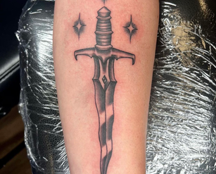 Dagger Tattoo by Taryn at Fine Ink Studios