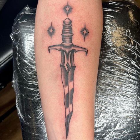 Dagger Tattoo by Taryn at Fine Ink Studios