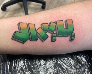 Graffiti Tattoo by Clint  at Fine Ink Oviedo