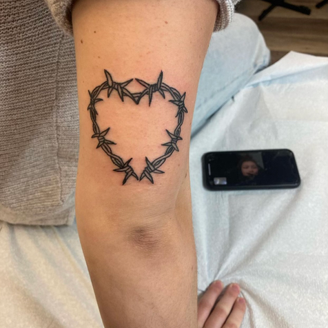Barb Wire Tattoo by Clint at Fine Ink Studios.HEIC