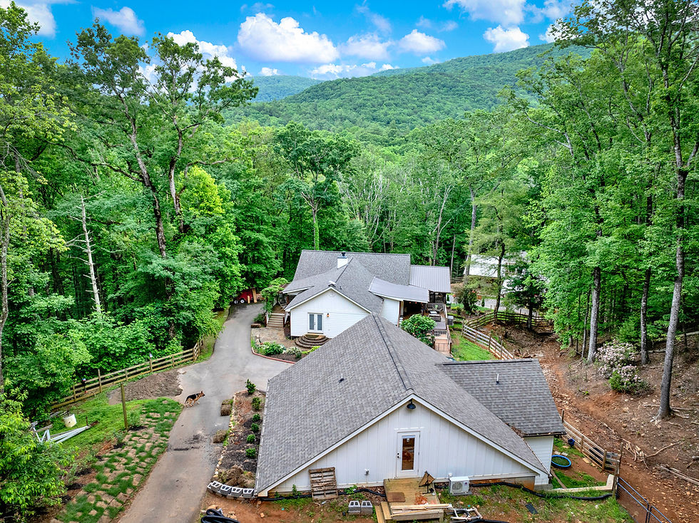 west view from upper pasture over barn house and barn.jpg