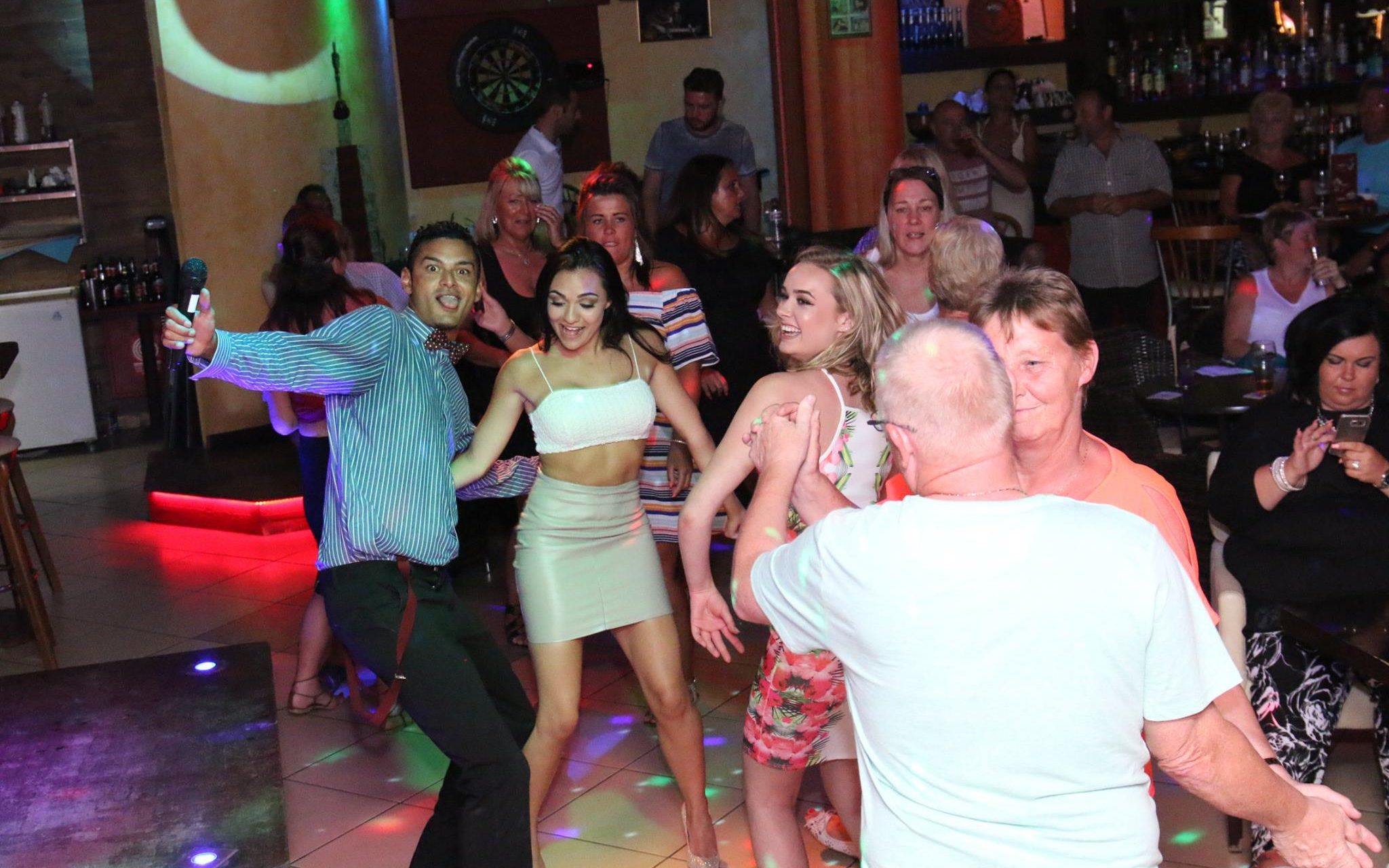 Entertainment and dancing inside Oscar's Entertainment Diner in Roda, Corfu