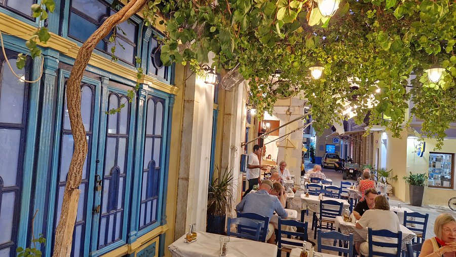 Outdoor tables at O Meraklis Taverna in Paleokastritsa