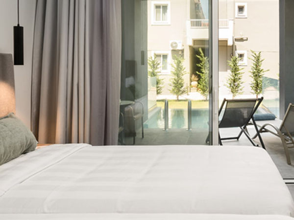 Guest room with pool view at Acharavi Beach Hotel in Acharavi, Corfu