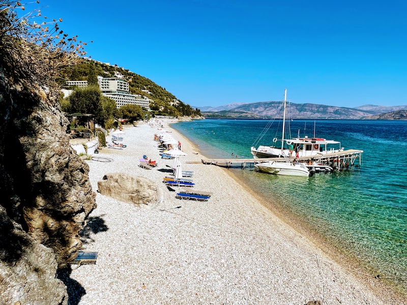 The small beach is operated by a nearby taverna and has seasonal sunbeds and parasols.