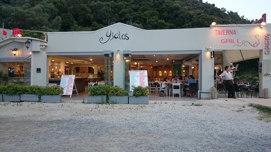 Yialos Beach Taverna overlooking the sea in Paleokastritsa