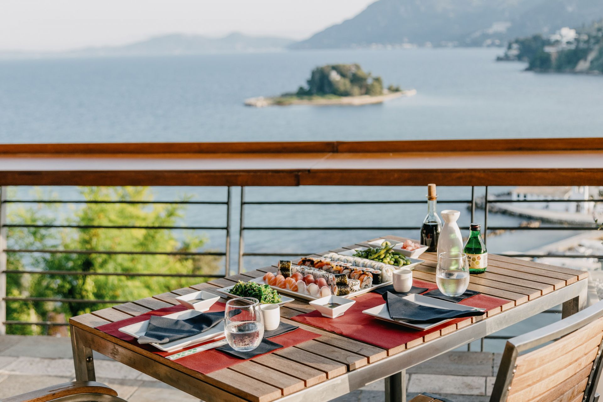 Kukutsi Sushi Bar terrace overlooking Mouse Island in Kanoni, Corfu