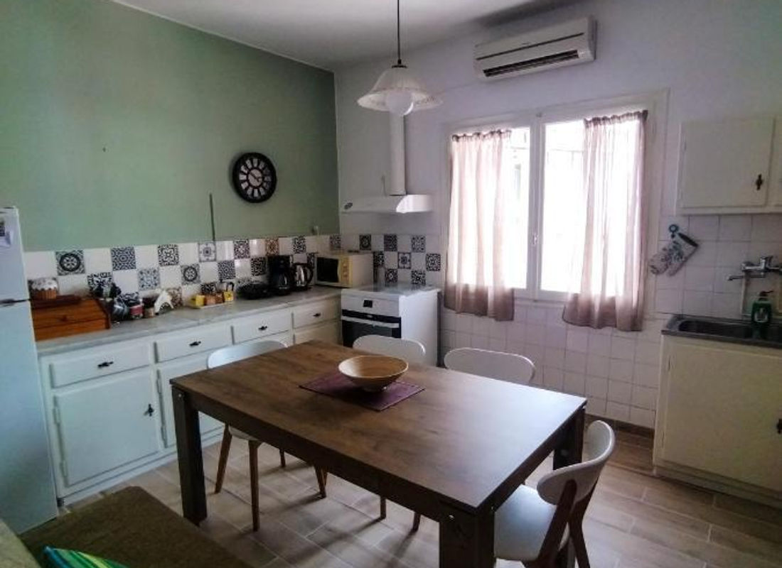 Kitchen and dining area at Alexandra's Apartment in Corfu Town