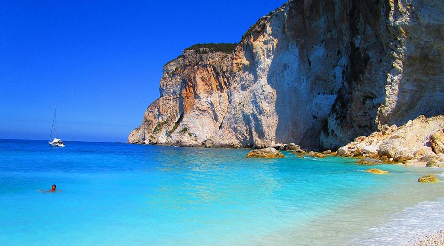 The Erimitis coves are natural and largely undeveloped, with no regular sunbed or parasol service. Bring your own shade and supplies.