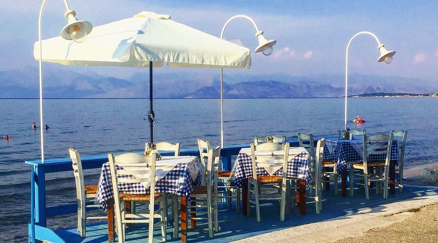 Ammos Grill Room seafront tables in Roda, Corfu