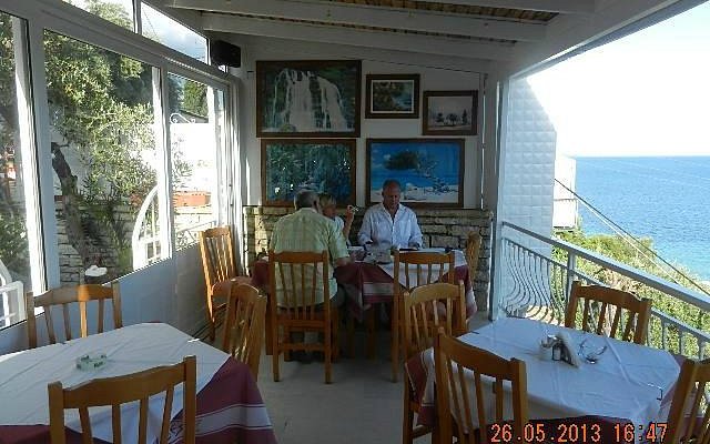 Caryatides restaurant terrace in Barbati, Corfu