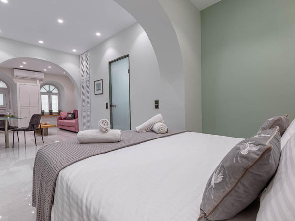 Bedroom and living area at Arches Urban Suite in Corfu Old Town