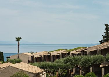 Aeolos Beach Resort is an all-inclusive seafront resort in Perama, Central Corfu, set among extensive gardens with sweeping Ionian Sea views and family accommodation.