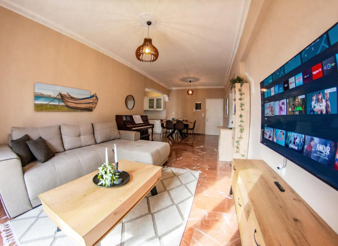 Living and dining area at Amalia Corfu Town Apartment
