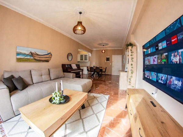 Living and dining area at Amalia Corfu Town Apartment